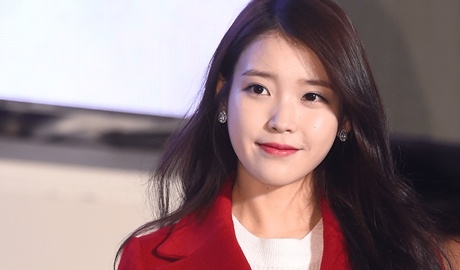 'Em gai quoc dan' IU dinh nghi van gian lan dau tu bat dong san hinh anh