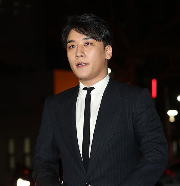 Seungri bi canh sat trieu tap anh 1