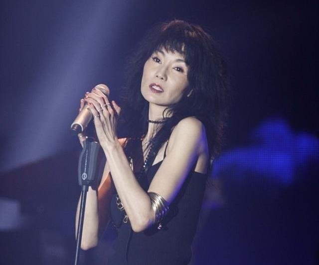 Truong Man Ngoc tuoi xe chieu anh 2