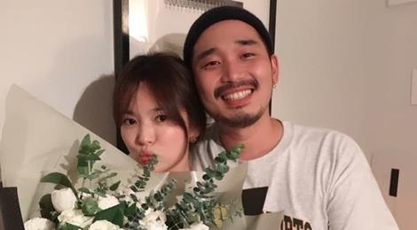 Song Hye Kyo don tuoi 38 ben ban be hinh anh