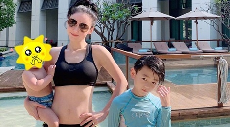 Truong Ba Chi khoe eo thon o tuoi 40 hinh anh