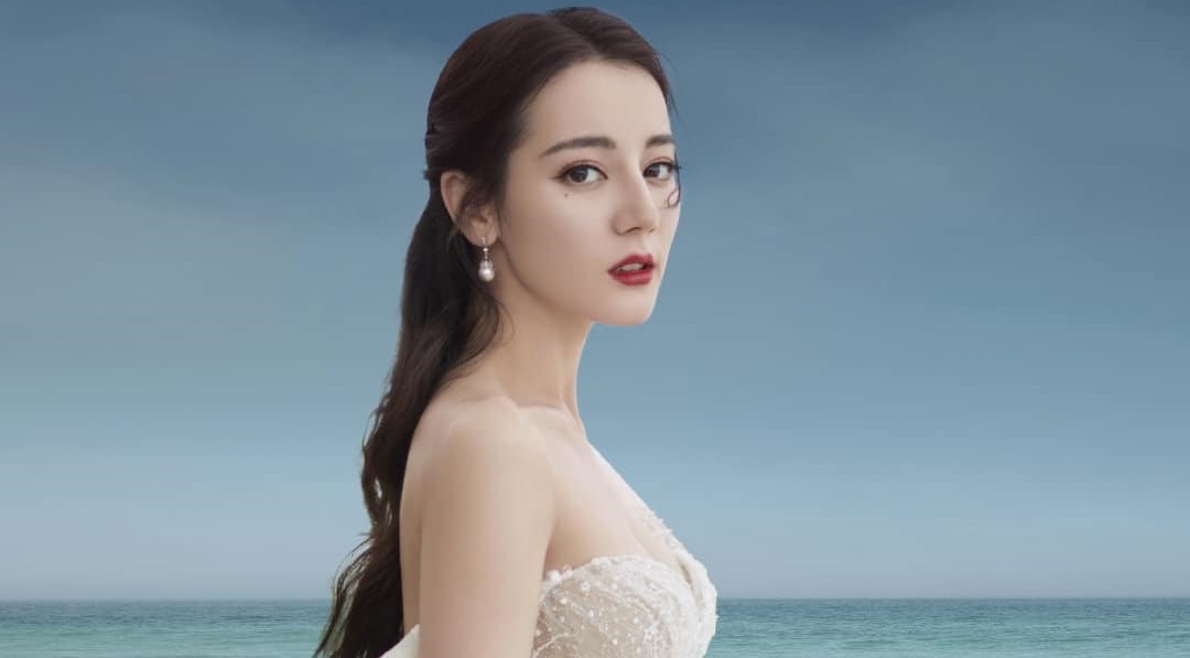 Dich Le Nhiet Ba duoc cau hon hinh anh