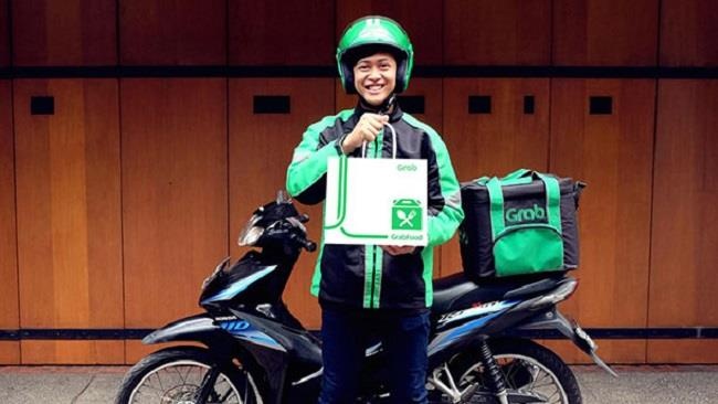 Grab va AhaMove - ai giao hang nhanh hon o TP.HCM? hinh anh
