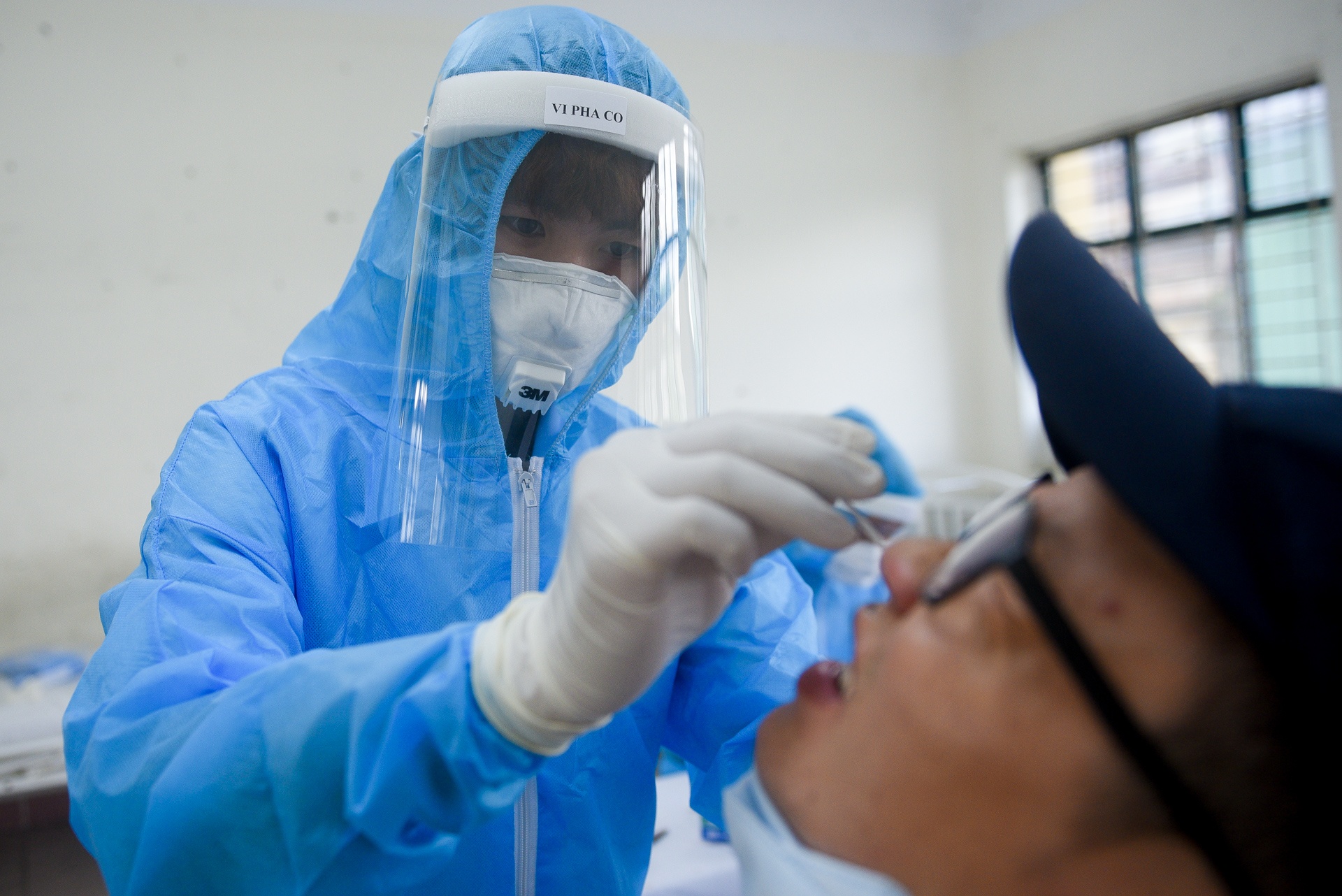 xét nghiệm Covid-19 cho người dân TP.HCM ảnh 3 xet nghiem Covid-19 cho nguoi dan TP.HCM anh 3