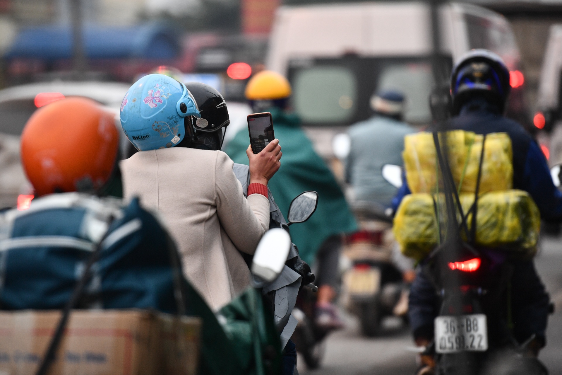 nguoi dan do ve Ha Noi sau Tet anh 7