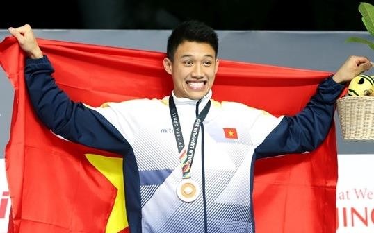 9X goc Viet duoc menh danh 'hot boy lang boi' tai SEA Games 29 hinh anh