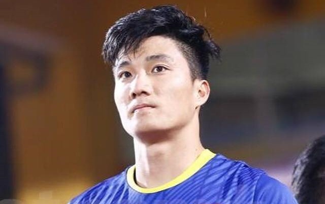 Van Hoang ve nuoc sau khi thi dau o giai U23 chau A hinh anh