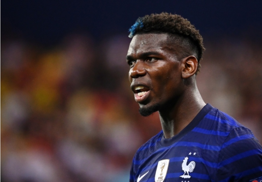 Man United can manh tay voi Pogba hinh anh