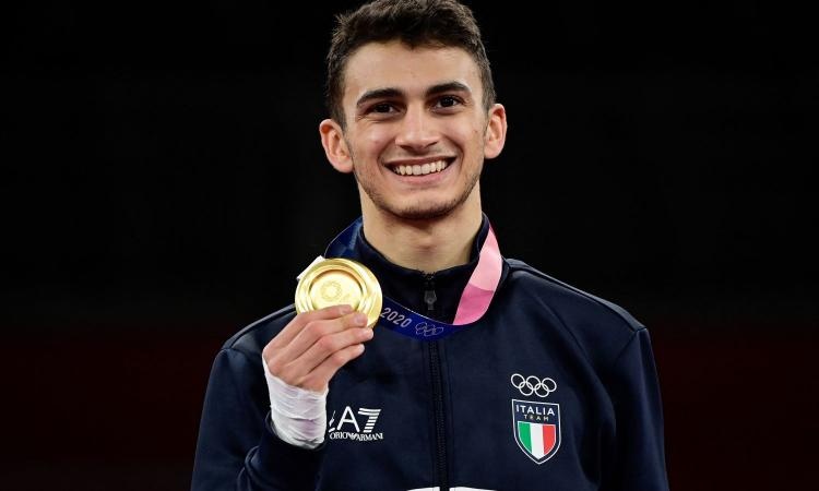 VDV sinh nam 2000 di vao lich su the thao Italy hinh anh