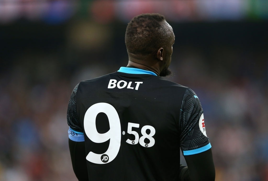 Usain Bolt choi bong da anh 1