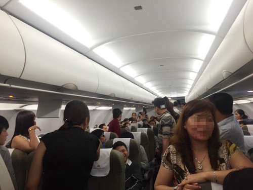 Nu hanh khach gay roi tren may bay bi phat 4 trieu dong hinh anh