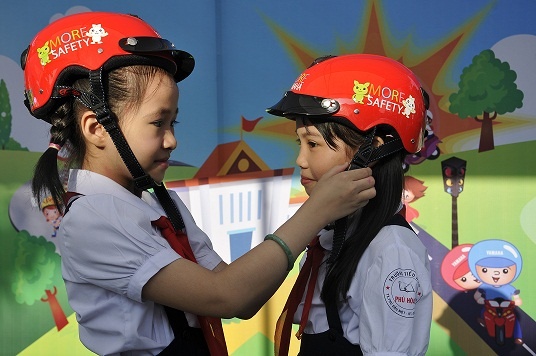 Tang hon 31.000 mu bao hiem cho hoc sinh tieu hoc hinh anh