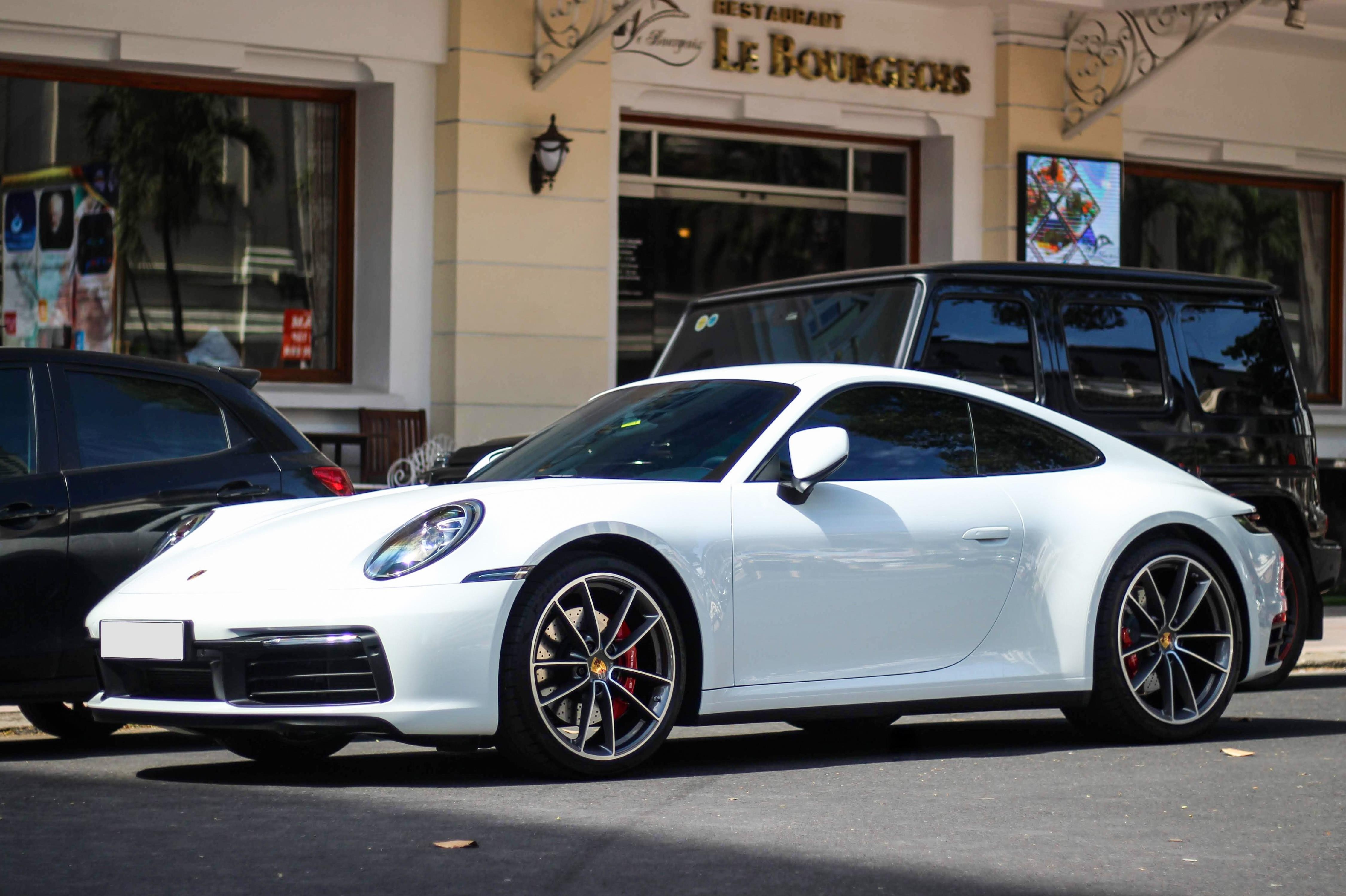 Vo chong Cuong Do La tau Porsche 911 Carrera S gia gan 8 ty hinh anh