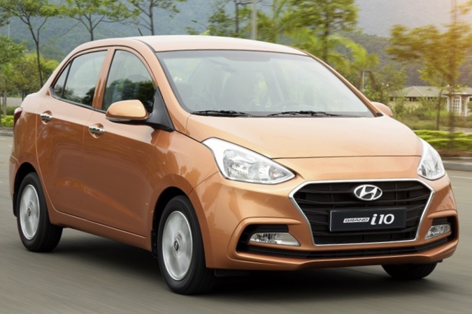 Voi 400 trieu dong, toi mua Grand i10 hay Toyota Corolla Altis doi cu? hinh anh