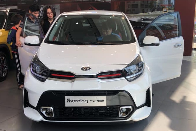 Mua xe lan dau, toi nen chon Kia Morning hay Honda City doi cu? hinh anh