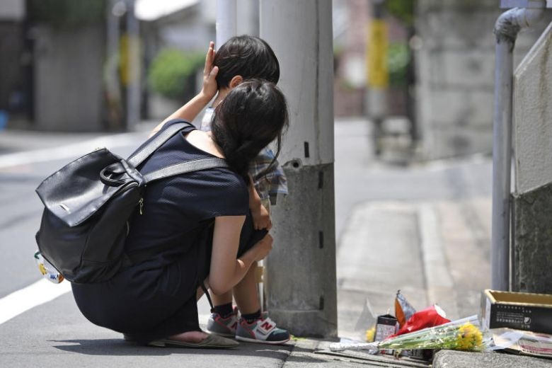 bao hanh tre em Nhat Ban anh 1