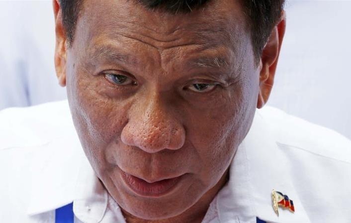TT Duterte ra lenh do rac xuong vung lanh hai 'bat ky' cua Canada hinh anh