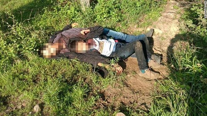 Cha con di cu bi cat co va moi nguy hiem chuc cho dan ti nan Trung My hinh anh