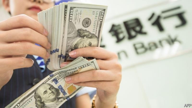 nhân dân tệ giảm giá ảnh 4 nhan dan te giam gia anh 4