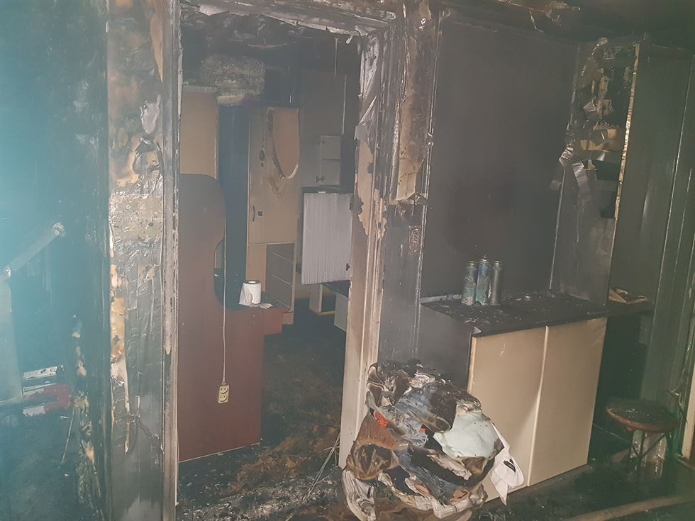 Bi an xac hai me con Han Quoc trong tu lanh, nha bi chay hinh anh