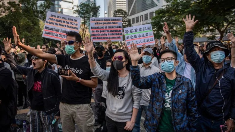 Trung Quoc bat nguoi Belize va Dai Loan nghi can thiep giup Hong Kong hinh anh