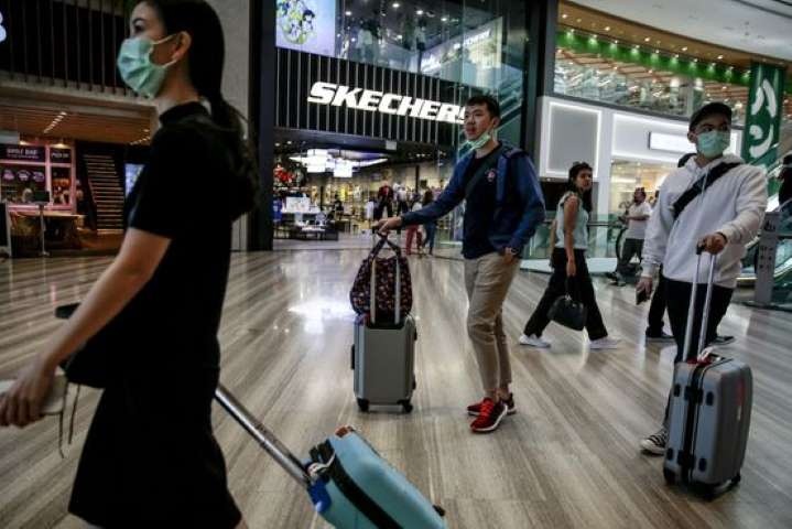 Virus corona lay lan khap A, Au tu mot hoi thao kinh doanh o Singapore hinh anh