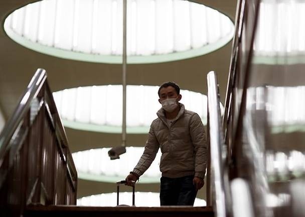 Trung Quoc cong bo them 24 ca nhiem Covid-19, Bac Kinh chiem 1/4 hinh anh