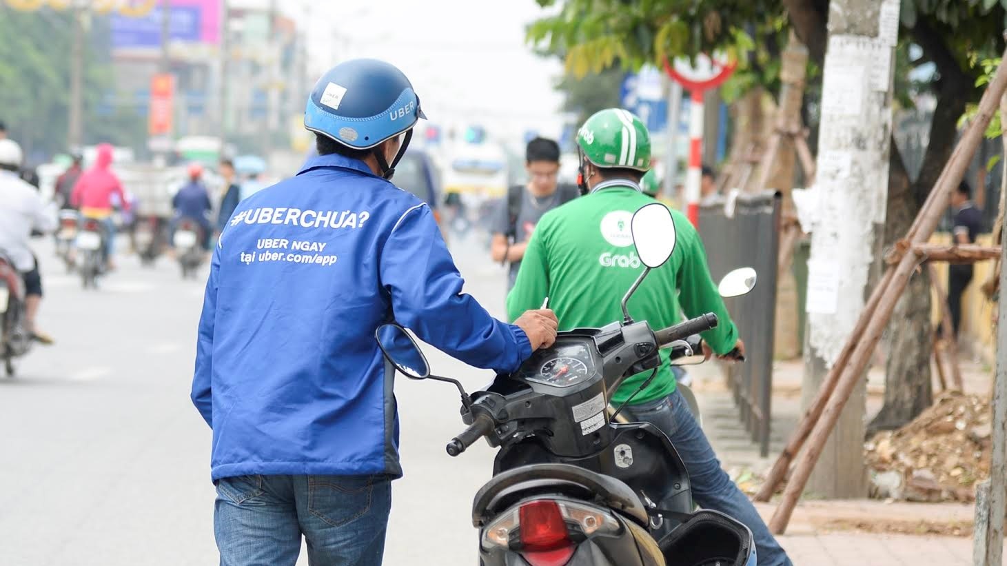 Loay hoay truoc 'con bao' Uber, Grab hinh anh