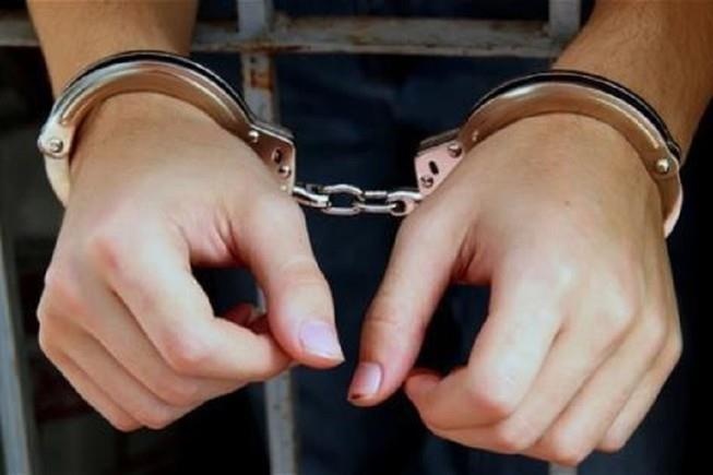 Chanh van phong TAND huyen bi bat vi lenh truy na 26 nam truoc hinh anh