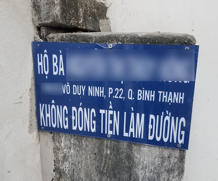 Ho dan o TP.HCM bi beu ten vi khong dong tien lam duong hinh anh