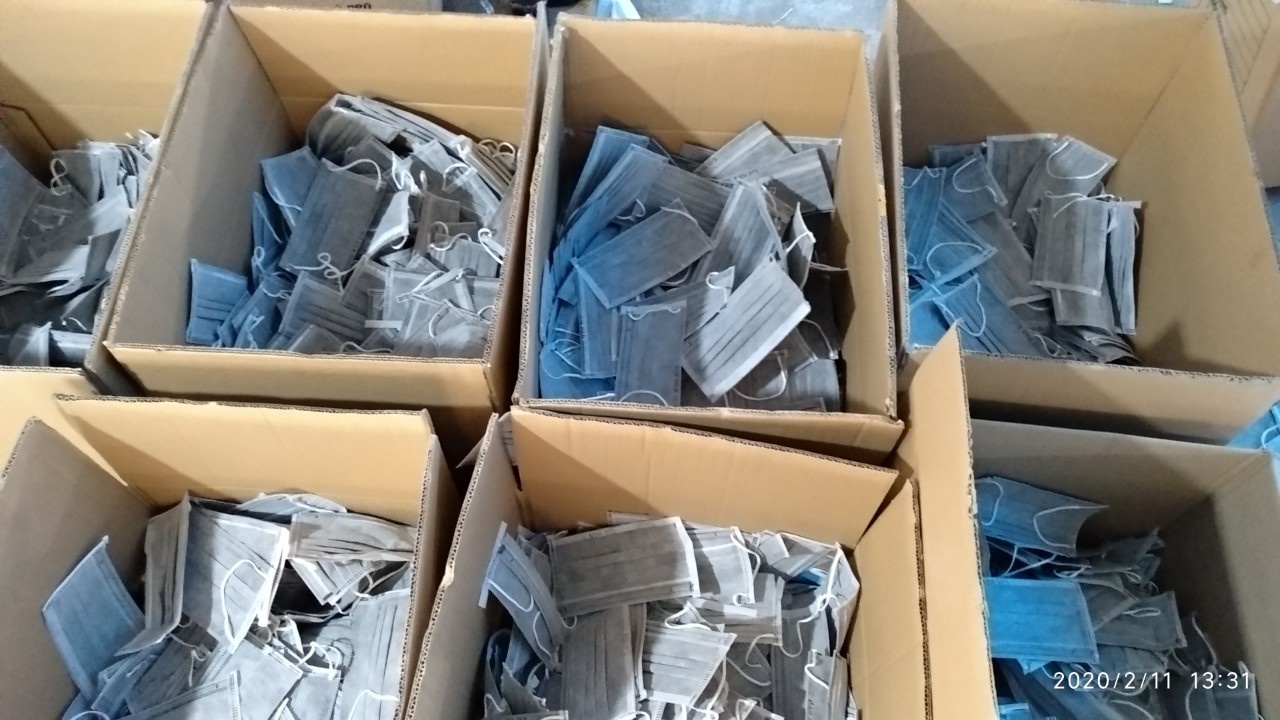 Gom hang nghin khau trang de ban ra TP.HCM anh 1