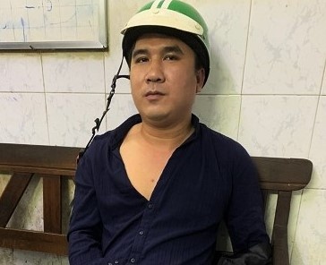 Lai xe om o TP.HCM cuop dien thoai cua khach nuoc ngoai hinh anh