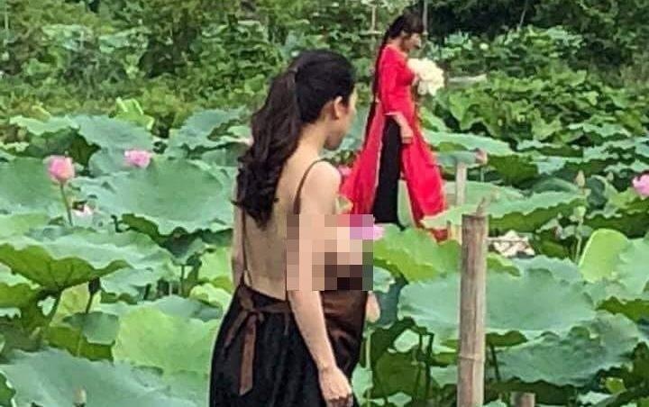 Lien tuc xuat hien anh chup gay tranh cai voi hoa sen hinh anh