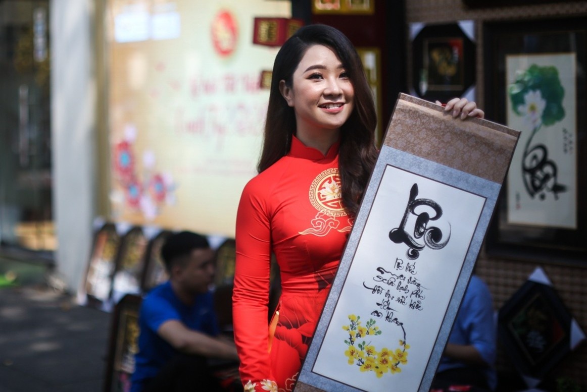 Loi chuc Tet hay tang cap tren, dong nghiep trong nam moi hinh anh