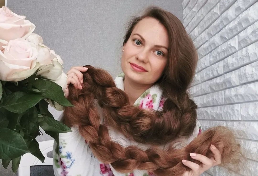 Co gai Ukraine co mai toc dai 1,67 m, khong cat trong 26 nam hinh anh