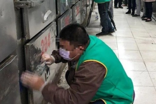 Tai xe say xin o Dai Loan bi phat lau don nha tang le hinh anh