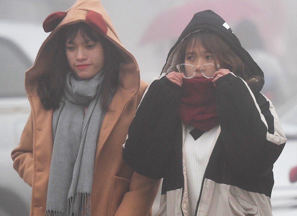 Nhieu cong ty cho nhan vien lam tai nha khi Ha Noi lanh 8 do C hinh anh