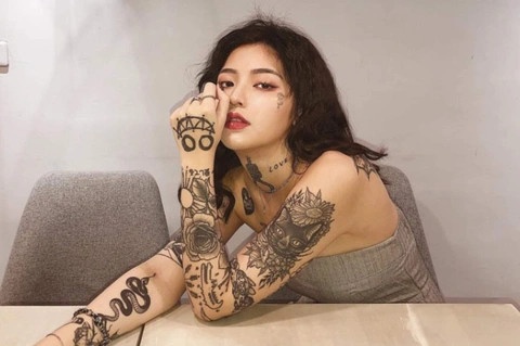 Nguoi tre Nhat Ban tim cach che hinh xam hinh anh