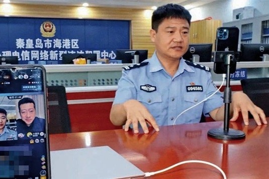 Canh sat phai nghi viec vi bat ngo noi tieng o Trung Quoc hinh anh