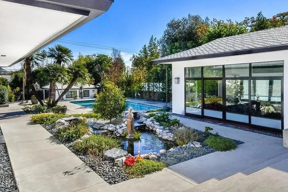 Nguoi trung so hon 2 ty USD tiep tuc mua nha hinh anh