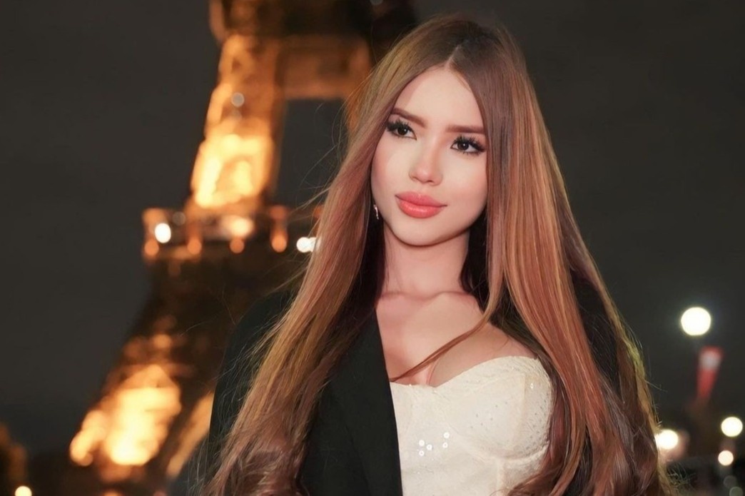 Nguoi mau bi bat nat vi ve ngoai noi bat hinh anh