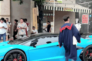 Thực hư clip chàng trai mặc áo cử nhân, lái Lamborghini gây bão mạng
