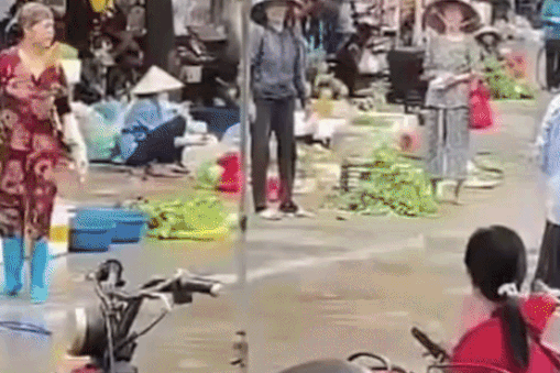 Cong an vao cuoc vu chu quan hai san xit nuoc vao mat cu ba ban rau hinh anh