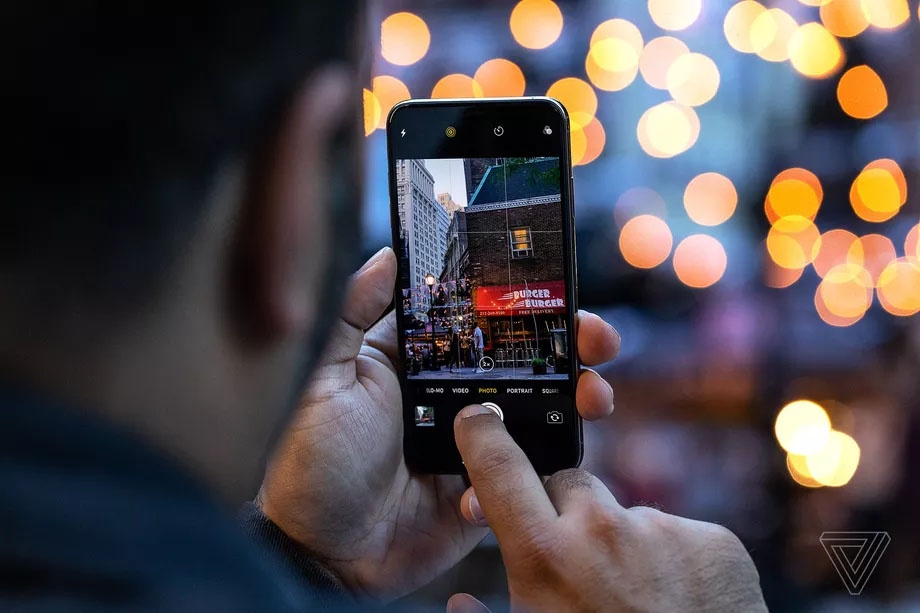 Apple dinh 'xai chua' anh iPhone cua moi nguoi nhung bat thanh hinh anh