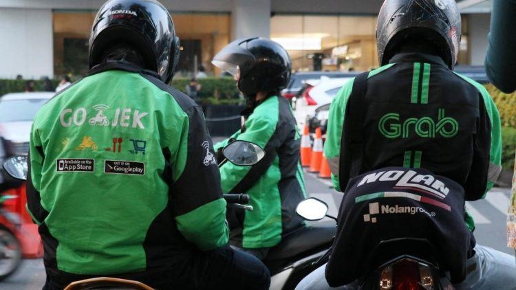 Bloomberg: Grab va Gojek gan hoan tat thu tuc sap nhap hinh anh