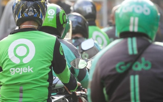 Ly do Grab, Gojek huong den viec hop nhat hinh anh