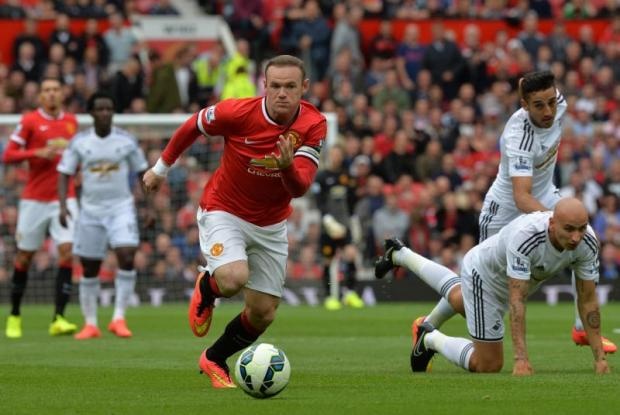 8. Wayne Rooney (Manchester United và ĐT Anh) - 31,2 km/h: Thi đấu khá điềm tĩnh nhưng khi cần mở tốc độ, Rooney cũng sẵn sàng cho các cầu thủ phòng ngự đối phương 