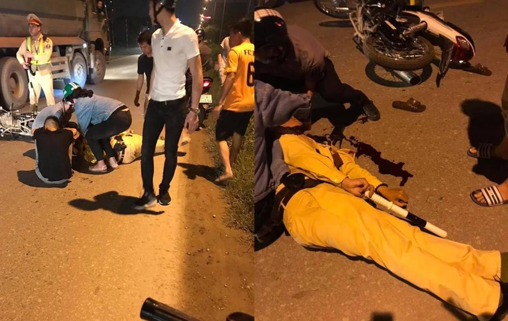 Thieu ta CSGT bi tong guc khi dang giu xe vi pham hinh anh