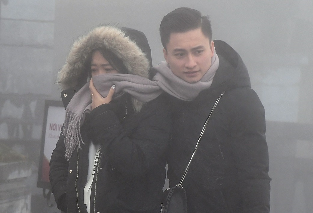 Mien Bac don Tet Duong lich trong gia lanh, Nam Bo nang nong hinh anh