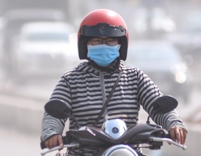 Ha Noi chim trong bui ban va suong mu hinh anh